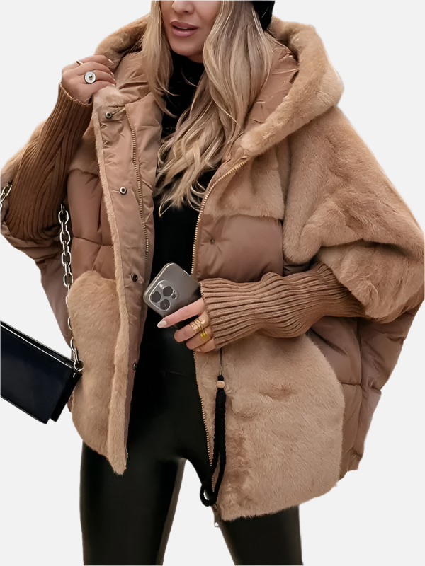 Warm women's puffer jacket with chic quilting and soft teddy lining, a stylish winter coat.