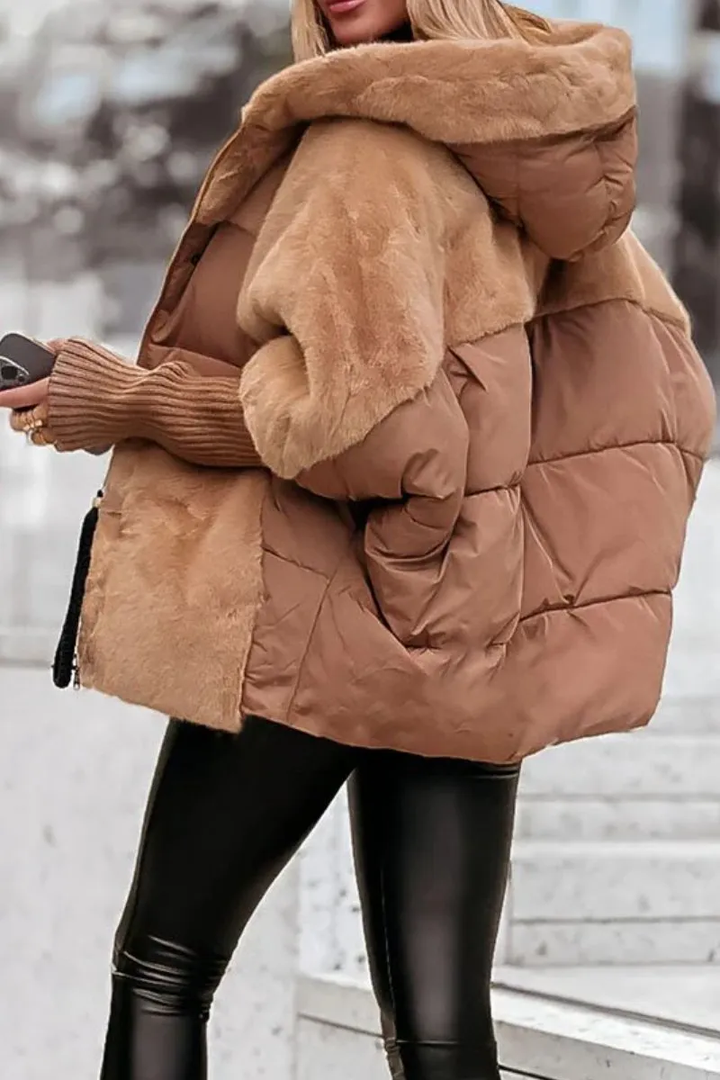 Women's elegant quilted puffer jacket, ideal winter coat with comfortable teddy lining.