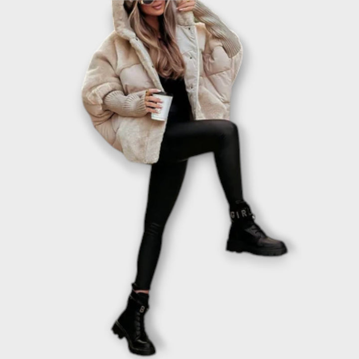 Casual winter outerwear: women's fashionable quilted puffer jacket with plush teddy lining.