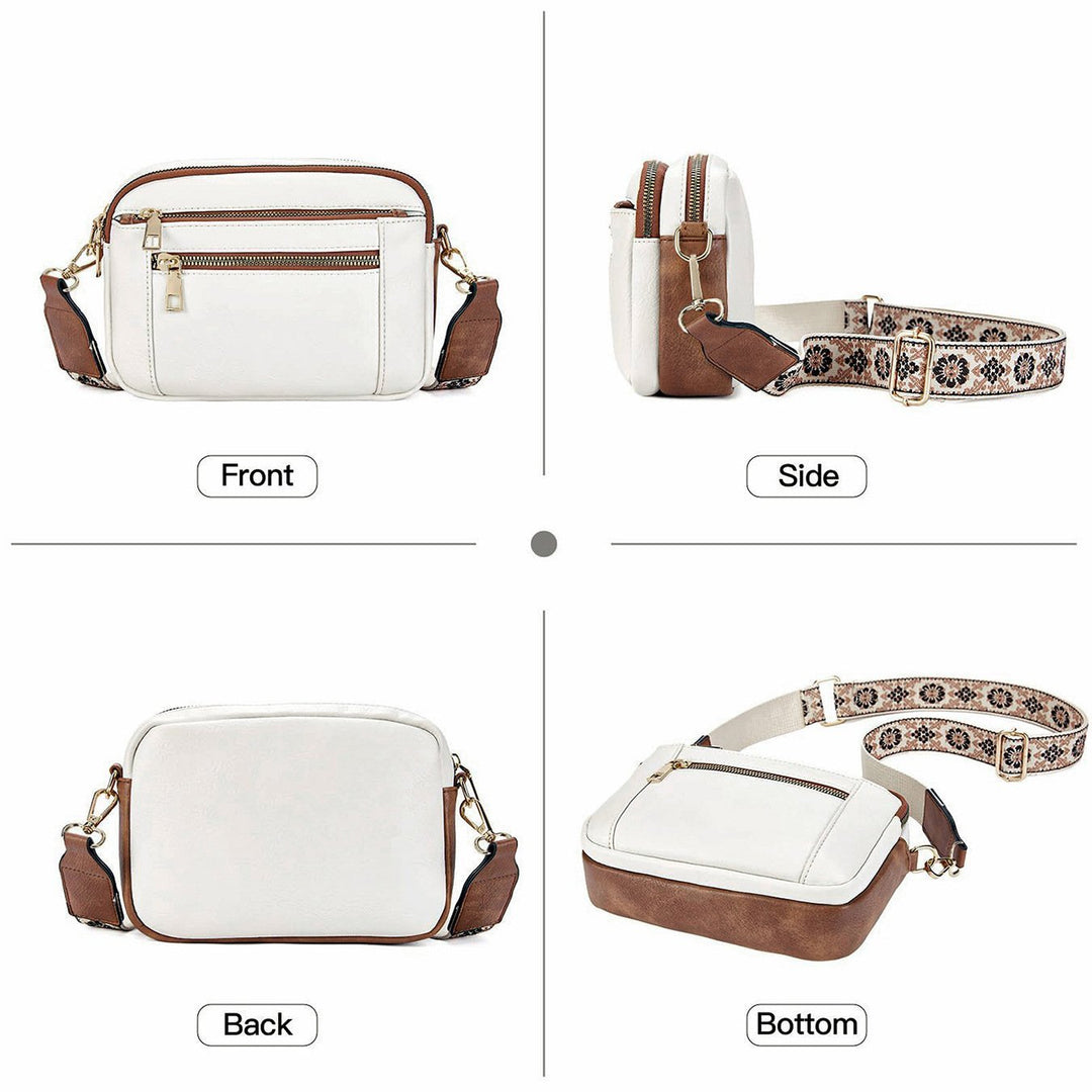 Women's refined crossbody handbag with ample storage, presented open to show interior