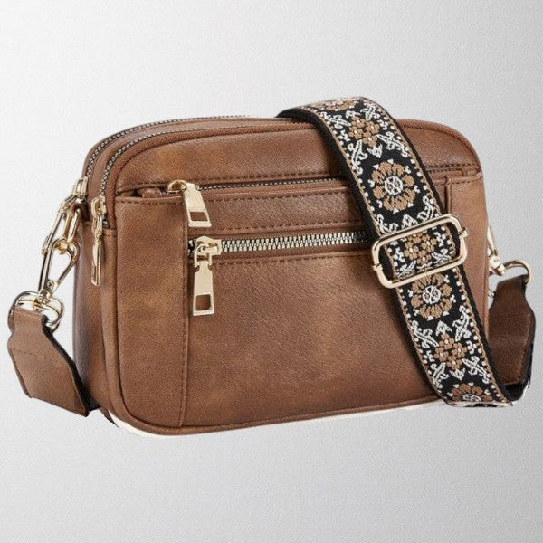 Chic women's refined handbag, ideal as a shoulder bag or crossbody for daily essentials
