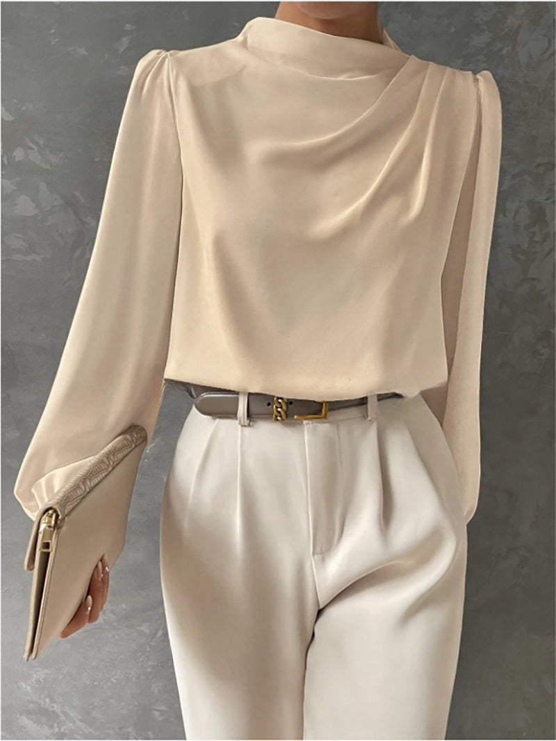 Elegant women's relaxed fit long sleeve blouse in white, perfect for business casual.