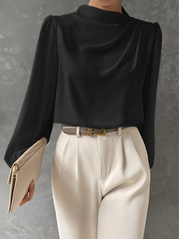 Elegant workwear: women's relaxed fit long sleeve blouse in a versatile design, perfect for any occasion.