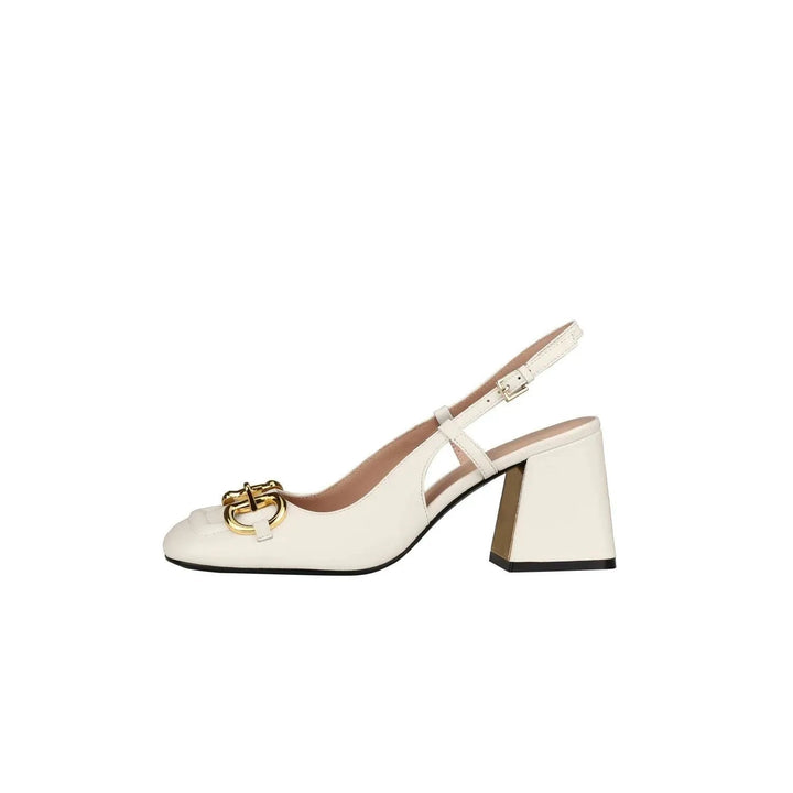 Retro-inspired women's high heel shoes, featuring an elegant buckle strap. Chic formal wear.