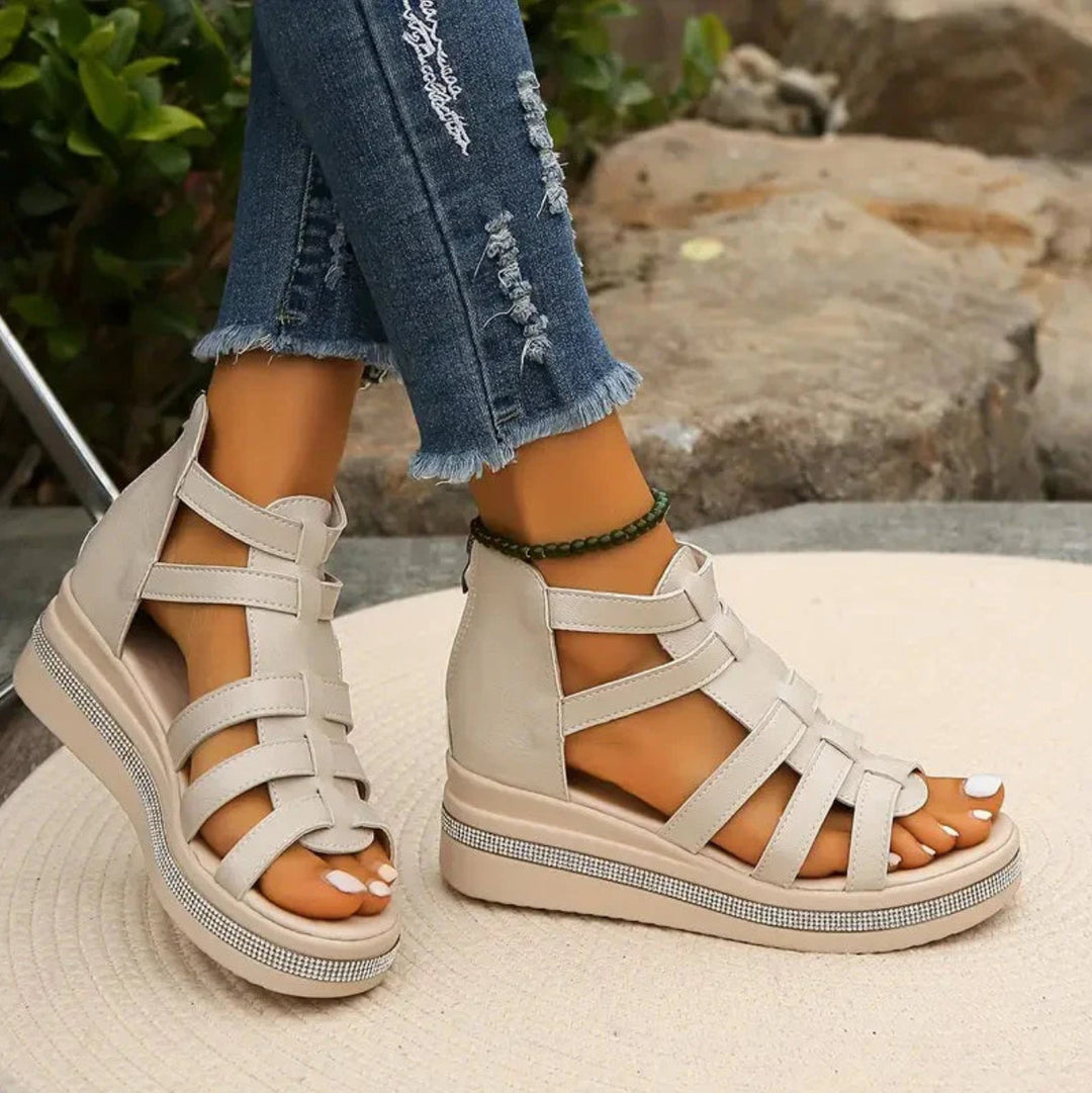 Women's summer footwear: shimmering rhinestone wedge sandals, angled shot highlighting sparkle