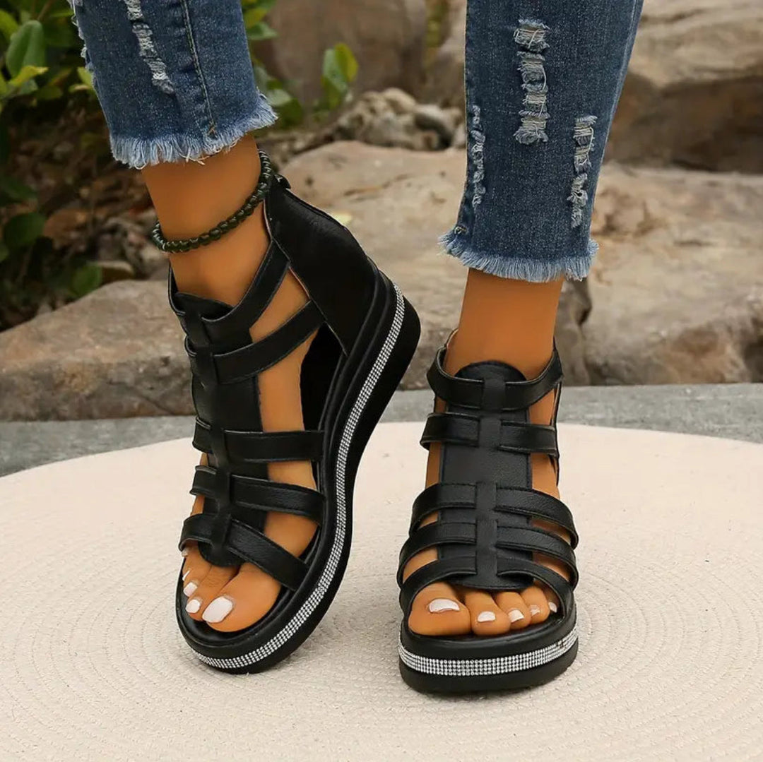 Bottom view of women's rhinestone wedge sandals, showing durable sole and wedge heel