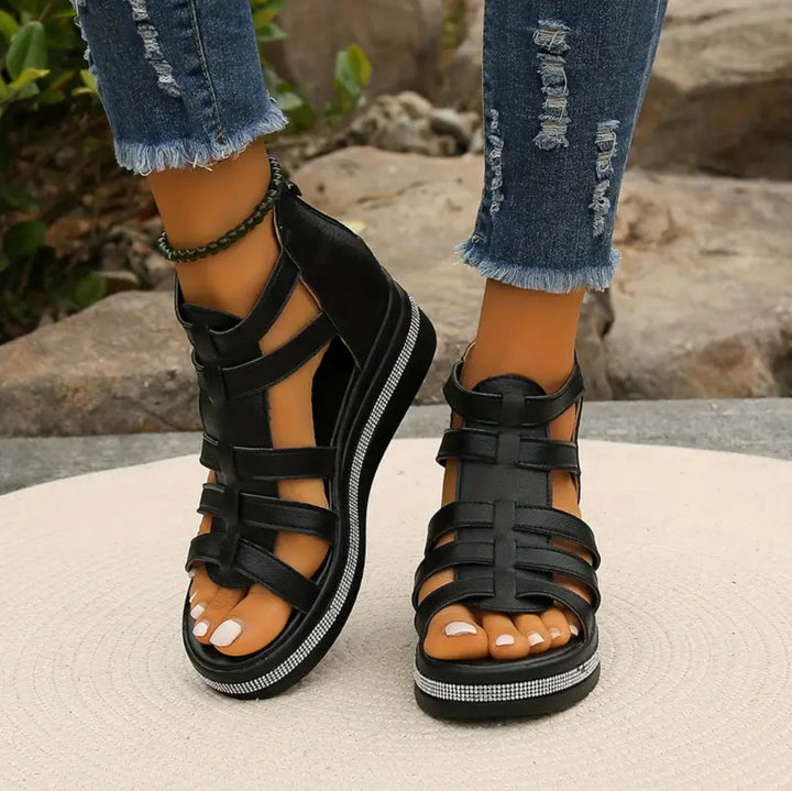 Bottom view of women's rhinestone wedge sandals, showing durable sole and wedge heel