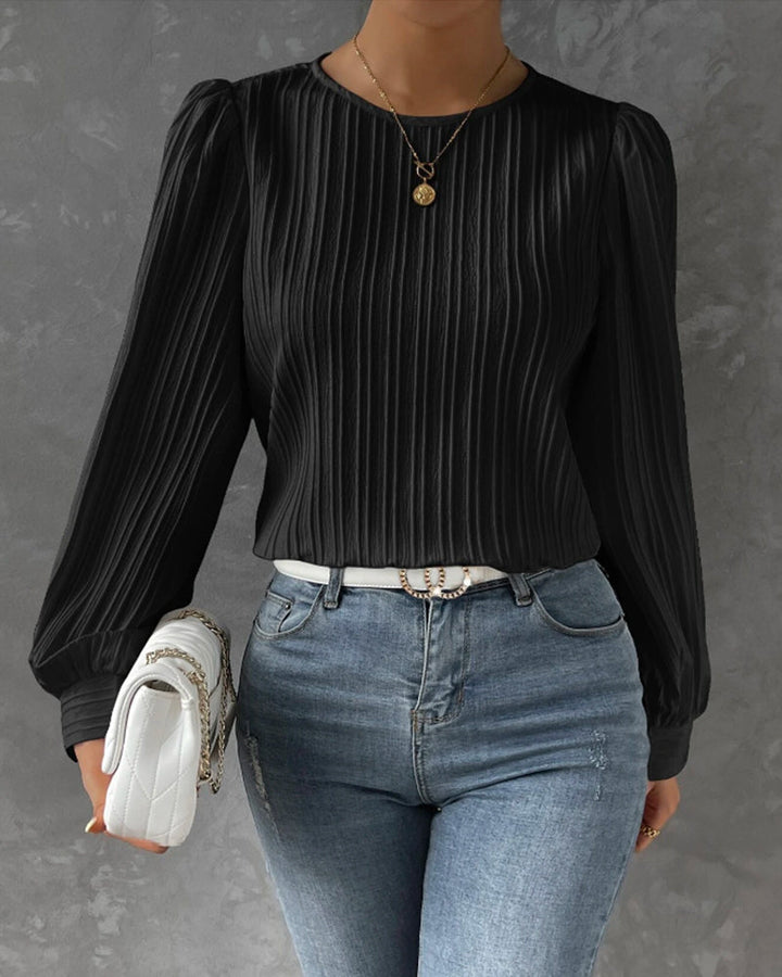 Women's elegant round neck long sleeve shirt. A versatile, comfortable, and classic blouse for timeless ladies style.