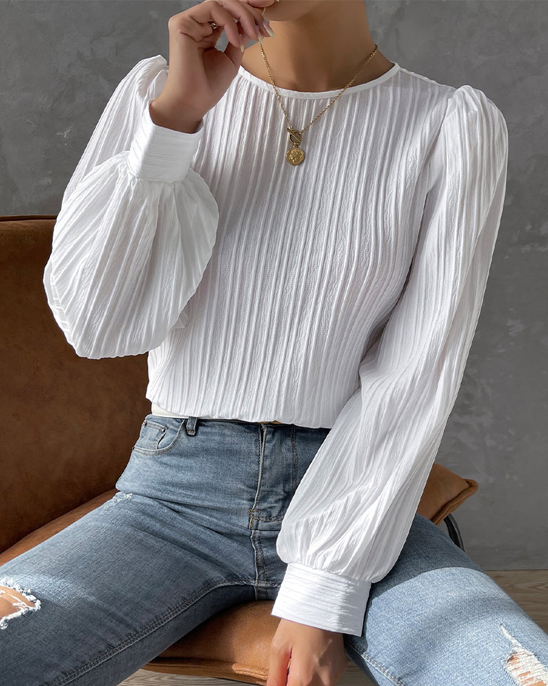 Timeless elegant women's round neck shirt. Classic long sleeve blouse, comfortable & versatile for ladies fashion.