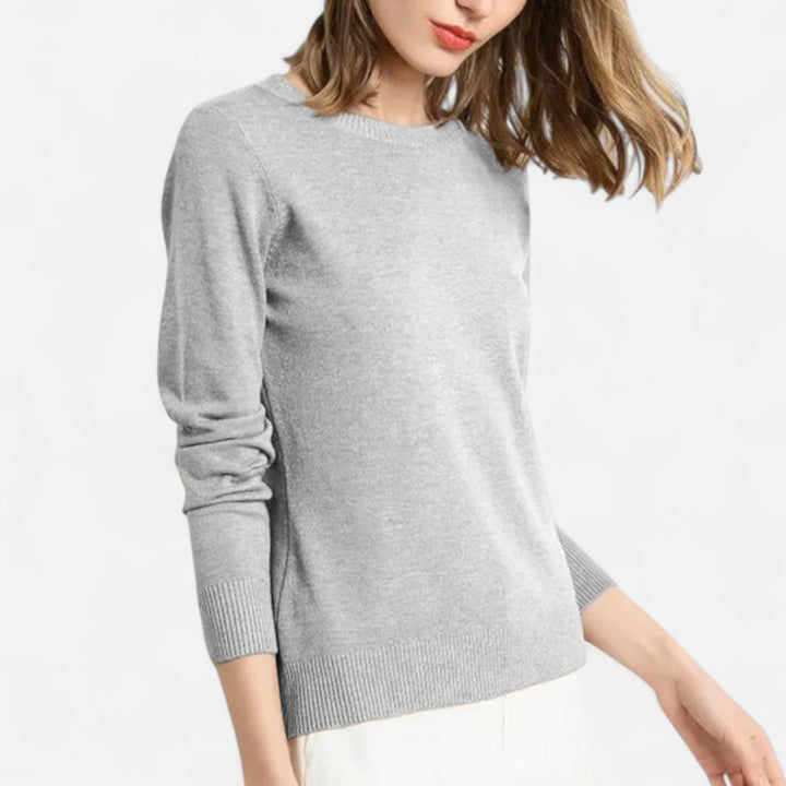 Elegant women's round-neck sweater in a classic style, perfect for sophisticated everyday comfort & timeless fashion.