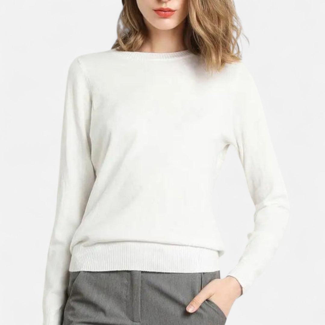 Sophisticated women's round-neck top, a long-sleeve sweater offering a classic, comfortable fit for any elegant occasion.
