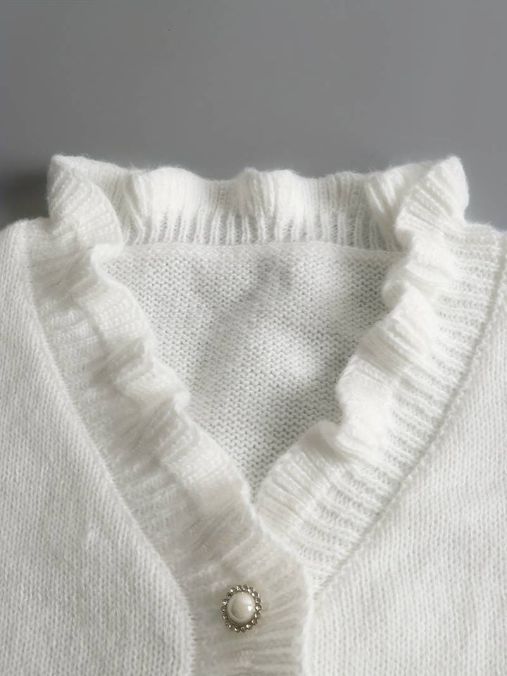 Casual yet chic women's ruffle blouse, ideal for fashion-forward daily wear, highlighting button details