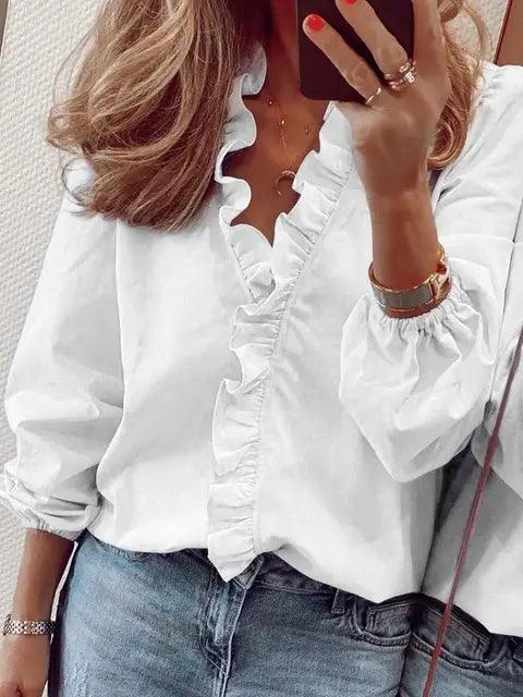 Stylish women's summer top featuring ruffle accents and a V-neck, offering a comfortable relaxed fit.