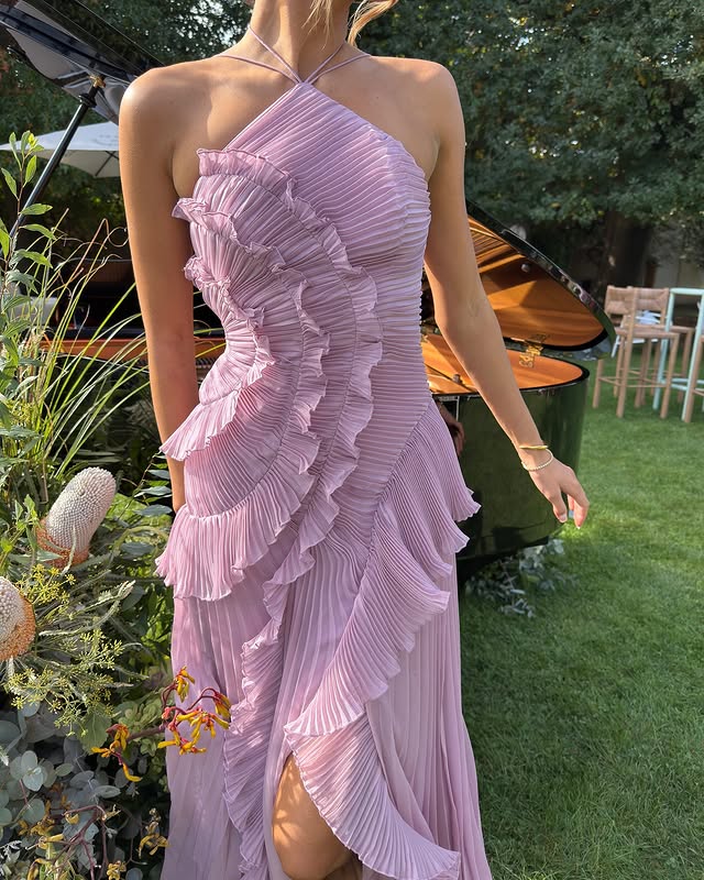 Lightweight & flowing women's ruffle halter maxi dress, exuding elegance for summer evenings.