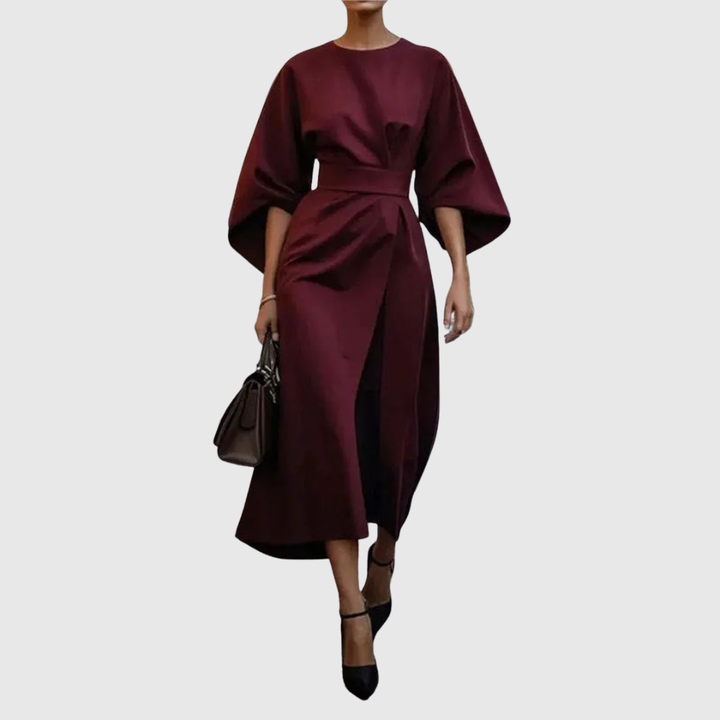 Elegant women's satin feel batwing sleeve maxi dress in black. Perfect for evening wear.