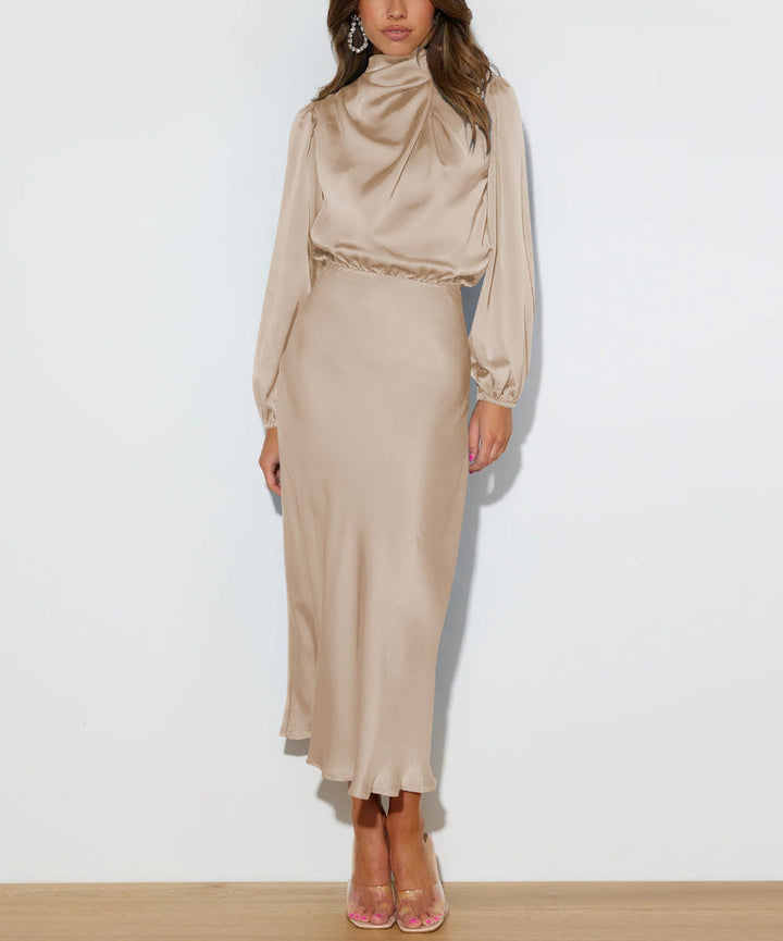 Luxe Evelina satin maxi dress, long sleeve, showcasing draped neck and elegant design.