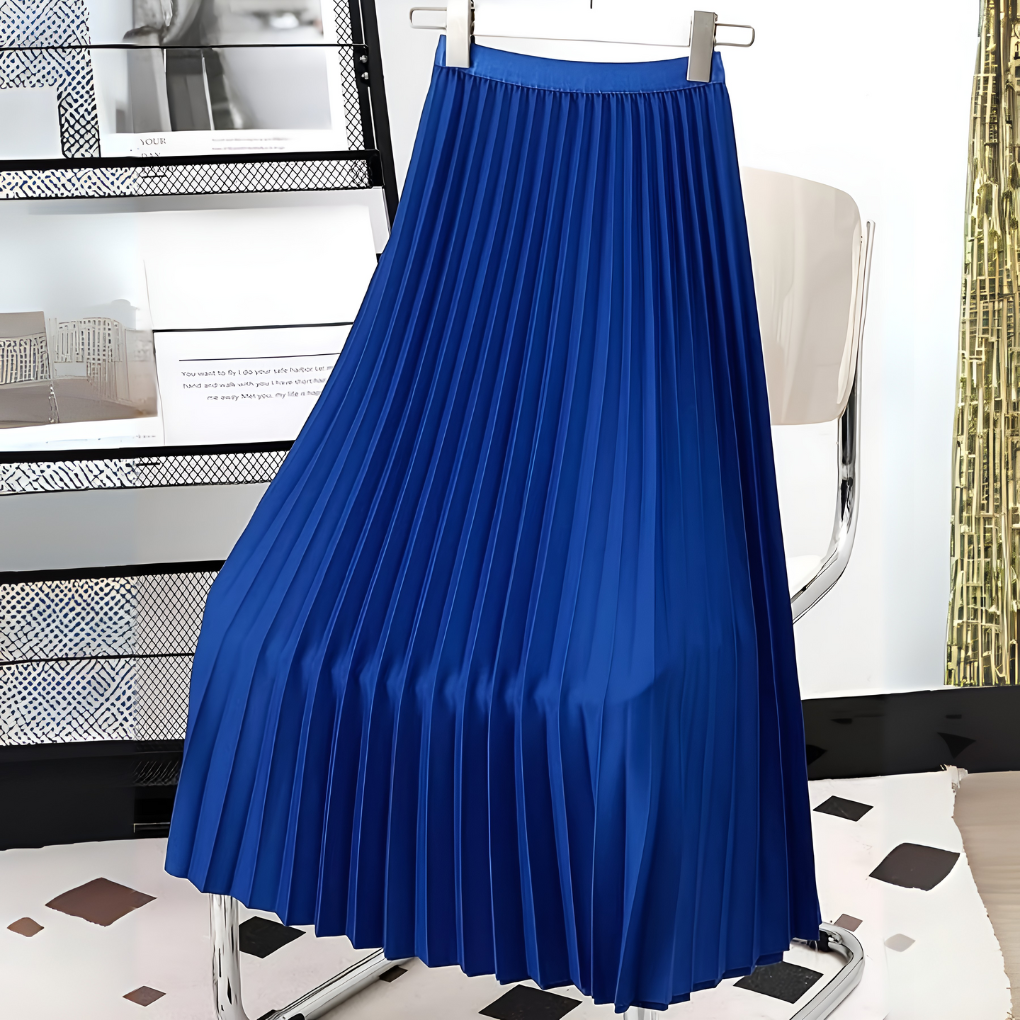 Full shot of a model wearing an elegant women's high-waist pleated satin midi skirt, new collection.