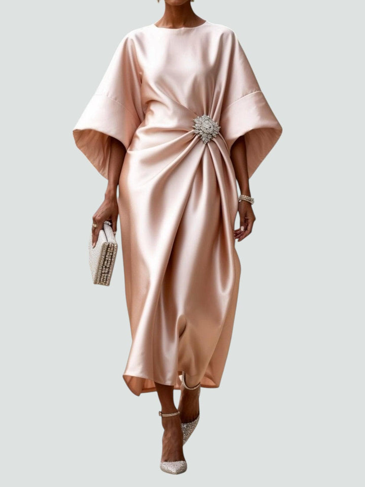 Fashionable women's party dress: a sculpted satin midi with elegant kimono sleeves and draped style.