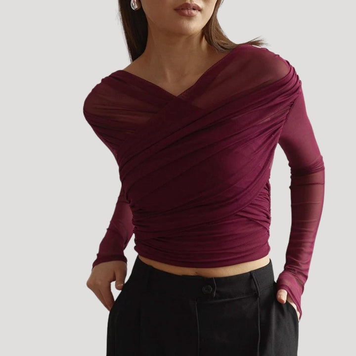 Casual yet chic women's sheer Wrap long-sleeve top, adding a stylish touch to any spring outfit.