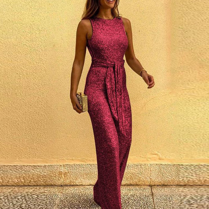 Glamorous women's wide-leg jumpsuit with shimmering fabric, ideal for eveningwear