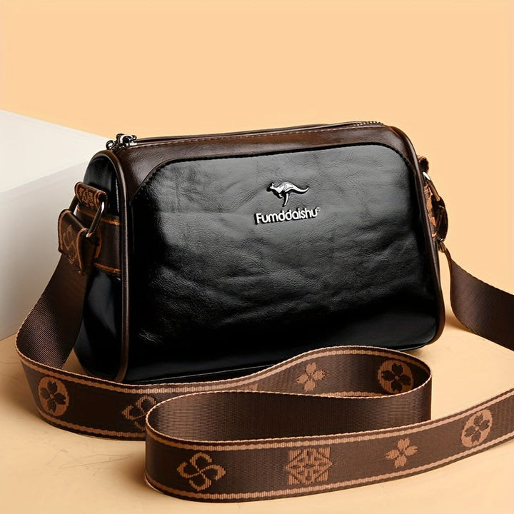 Elegant women's shoulder bag with adjustable strap. Classic design, perfect for daily use & work. Versatile style.