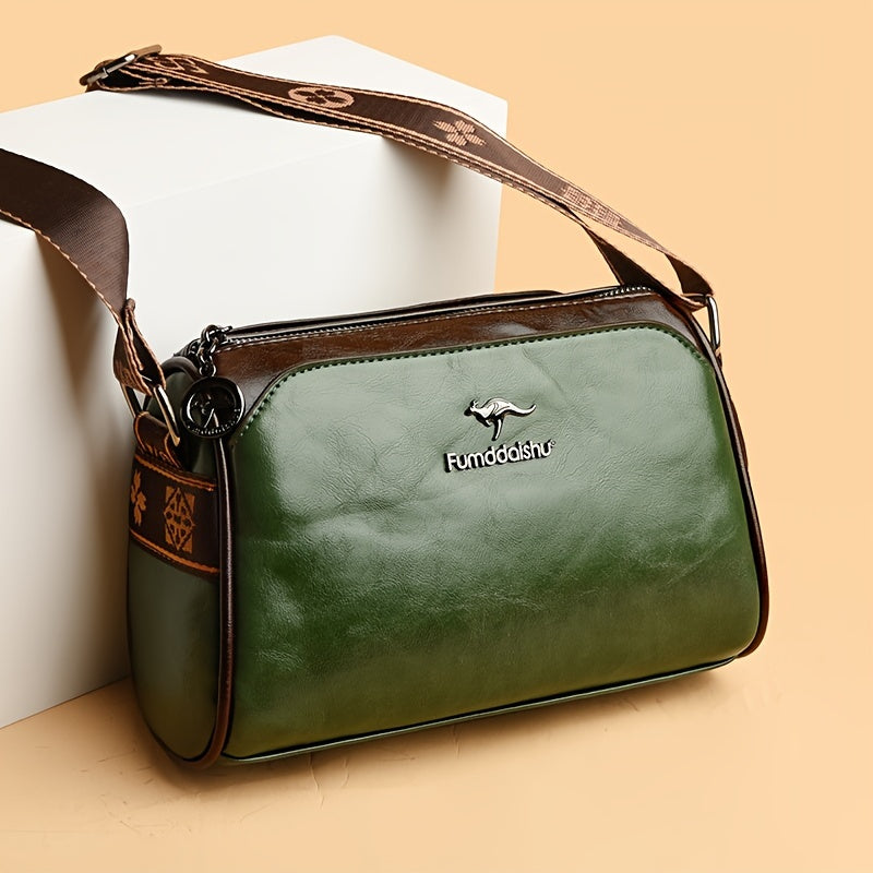 Black elegant women's shoulder bag. Classic, versatile handbag design with an adjustable strap for all occasions.
