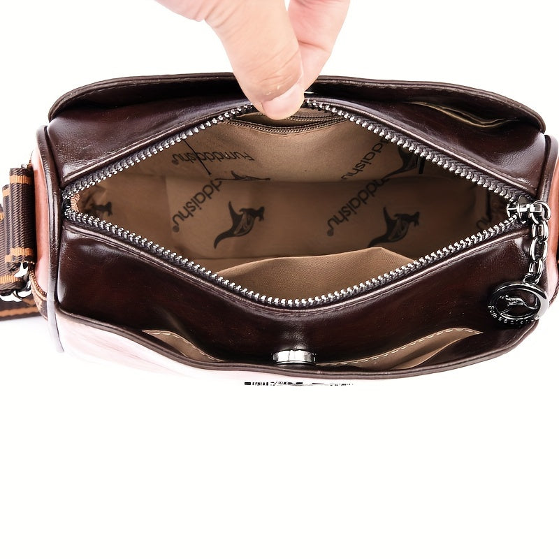 Green elegant women's shoulder bag. Classic style with an adjustable strap, perfect versatile work accessory.