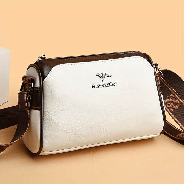 Women's elegant shoulder bag with adjustable strap. Classic style handbag, versatile for work or daily use.