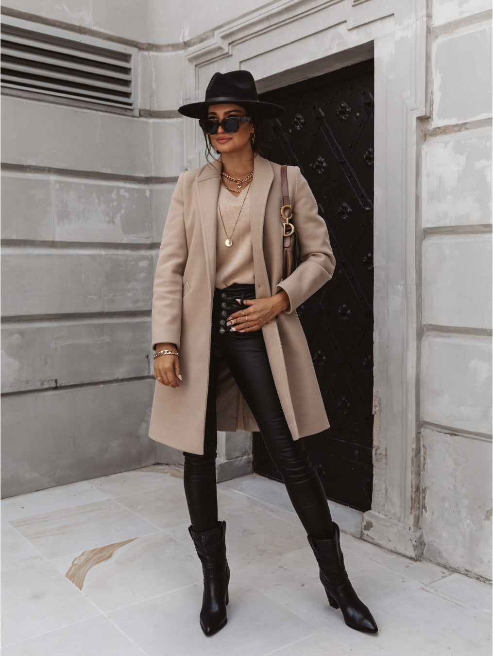 Elegant women's single-breasted button formal coat in black, perfect for winter business attire.