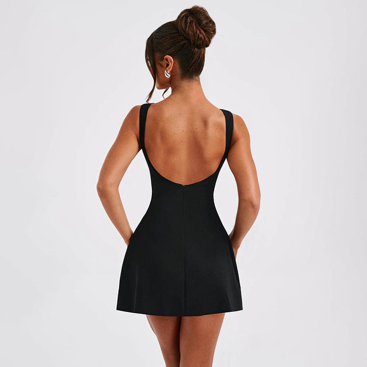 Stylish short cocktail dress for women with an open back & a flowy A-line cut, ideal for evening events.