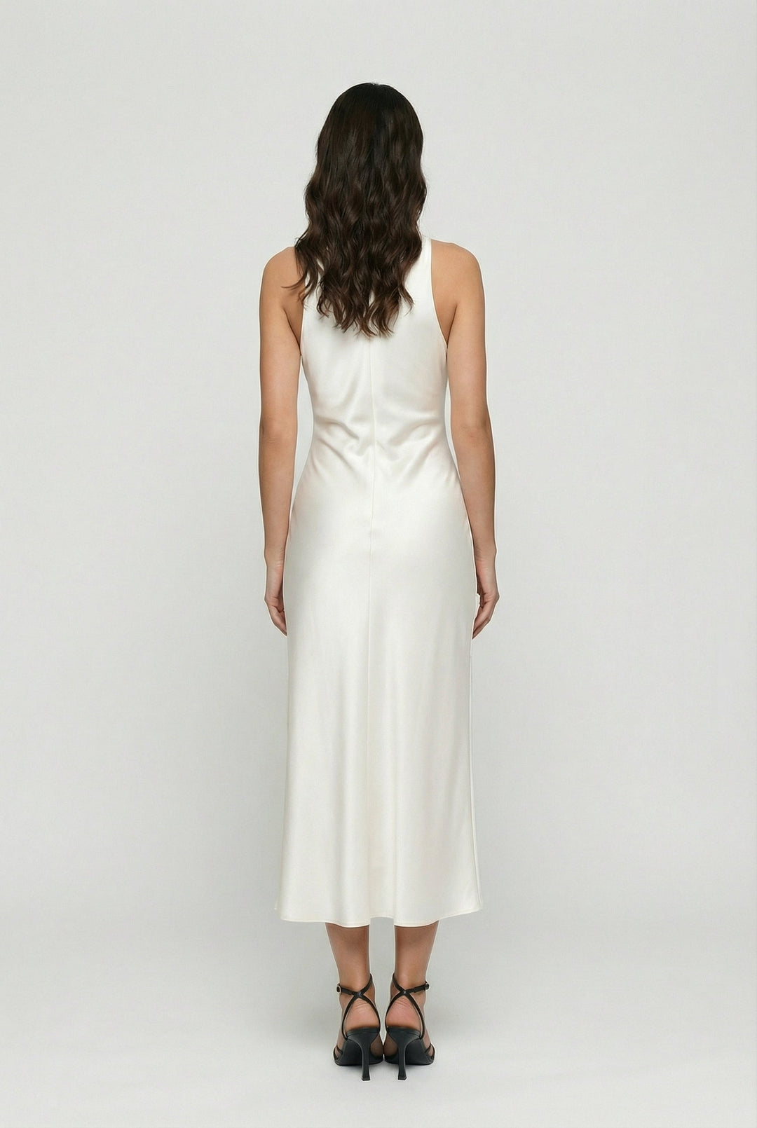 Sophisticated sleeveless midi dress for women with elegant cowl neck and stylish ruching, suitable for parties.
