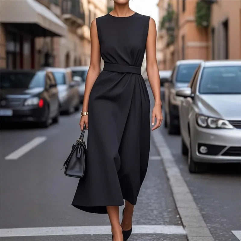 Chic white midi dress for women featuring a round neck, flowy design, perfect for formal or casual wear.