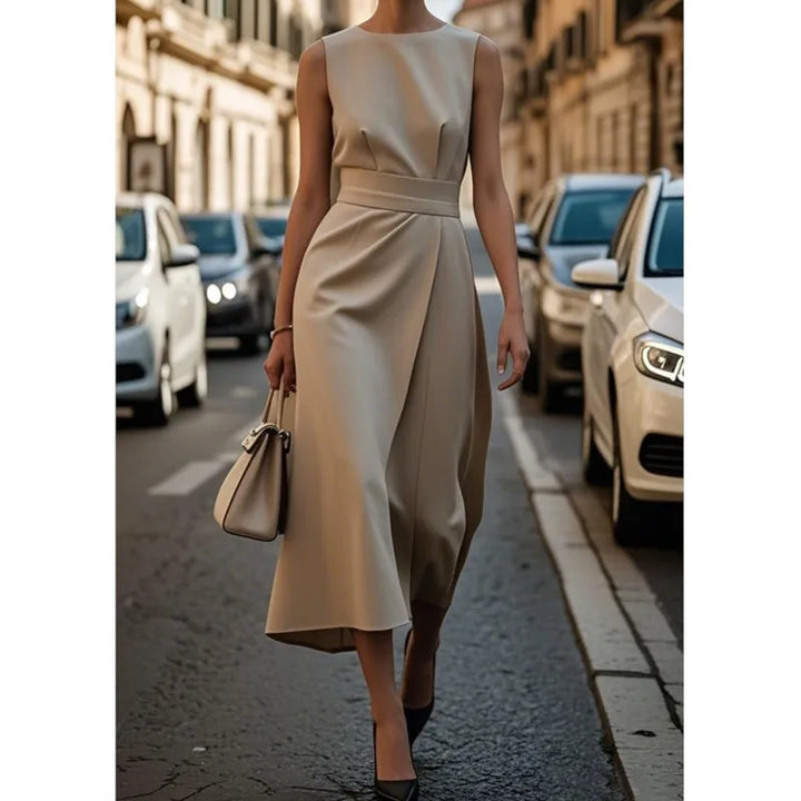Back view of a women's elegant sleeveless midi dress showcasing its comfortable and flowy design.
