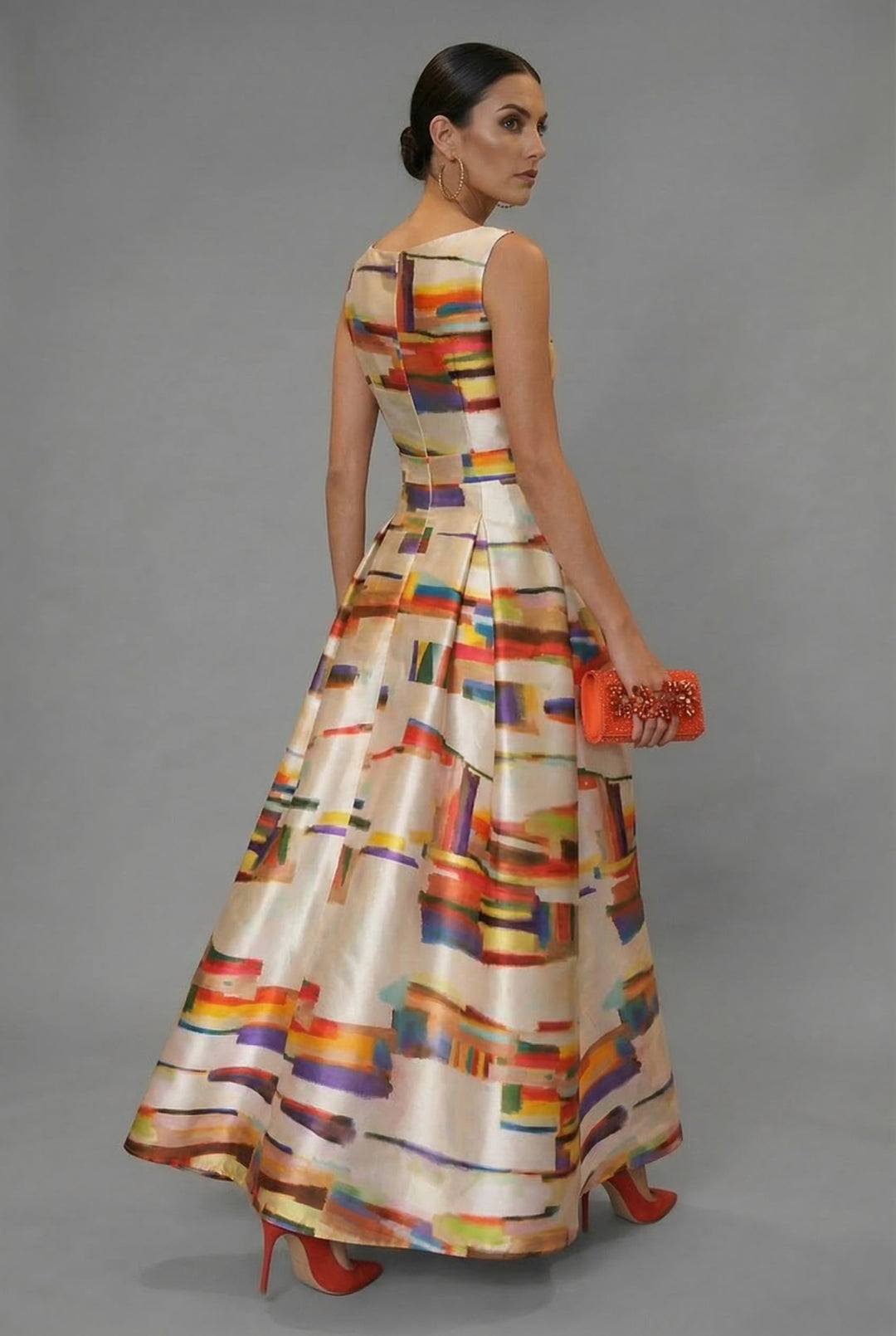 Elegant formal evening gown. Women's sleeveless multicolour maxi dress, perfect for sophisticated special occasions.