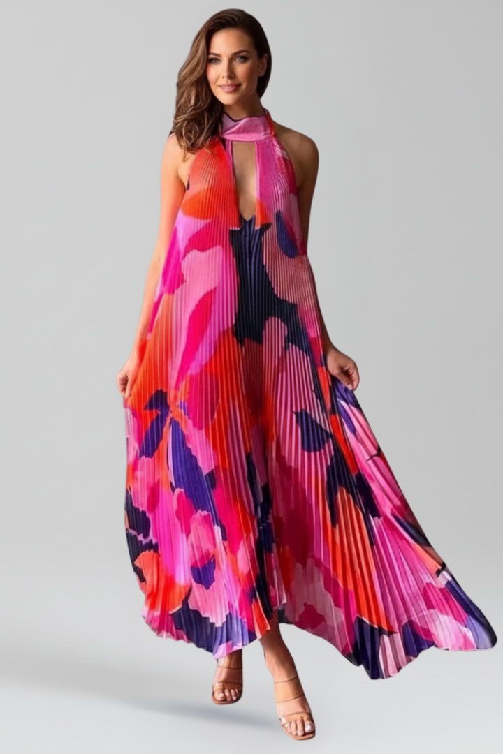 Flowy pleated maxi dress for women, ideal for casual and elegant occasions.
