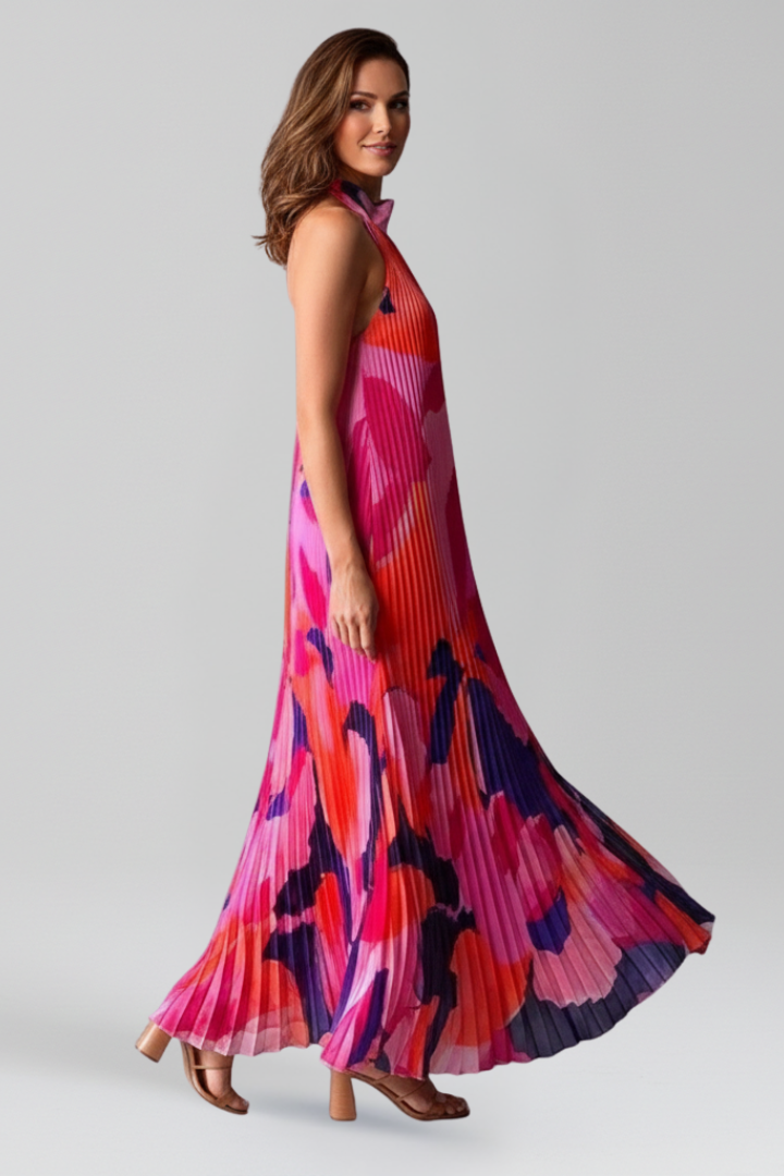 Women's sleeveless maxi dress with delicate pleats, a summer fashion essential.