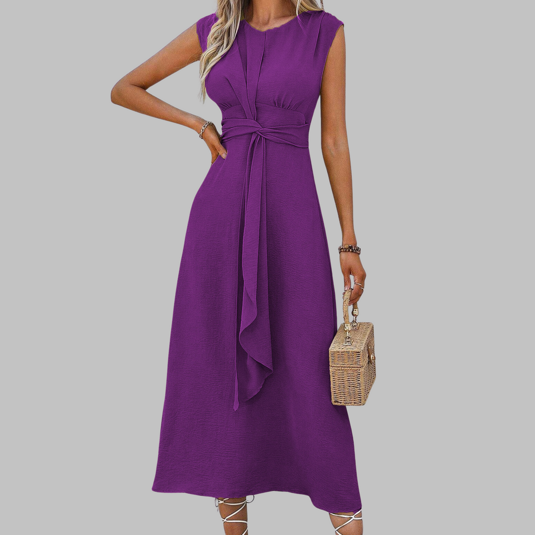 Stylish women's round neck sleeveless maxi dress, long and flowy, offering an elegant silhouette.