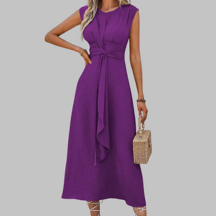 Stylish women's round neck sleeveless maxi dress, long and flowy, offering an elegant silhouette.