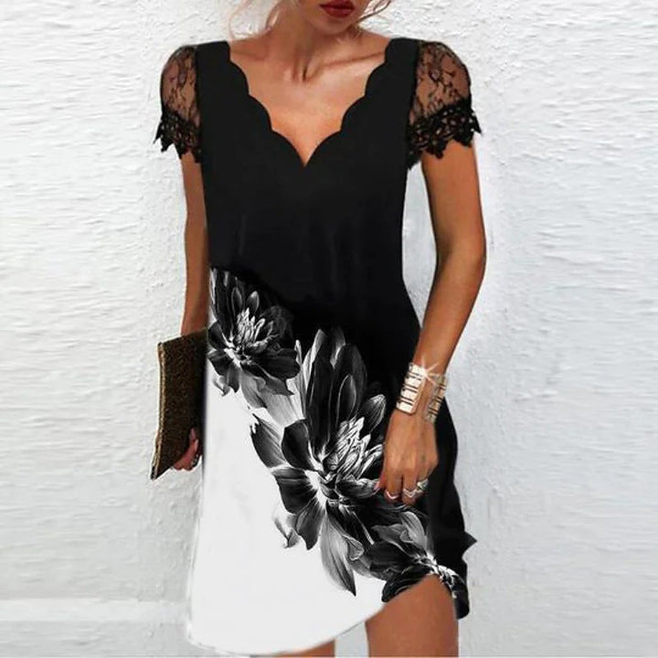 Formal women's party dress featuring a sophisticated scalloped neckline and sleeveless design, ideal for special occasions.