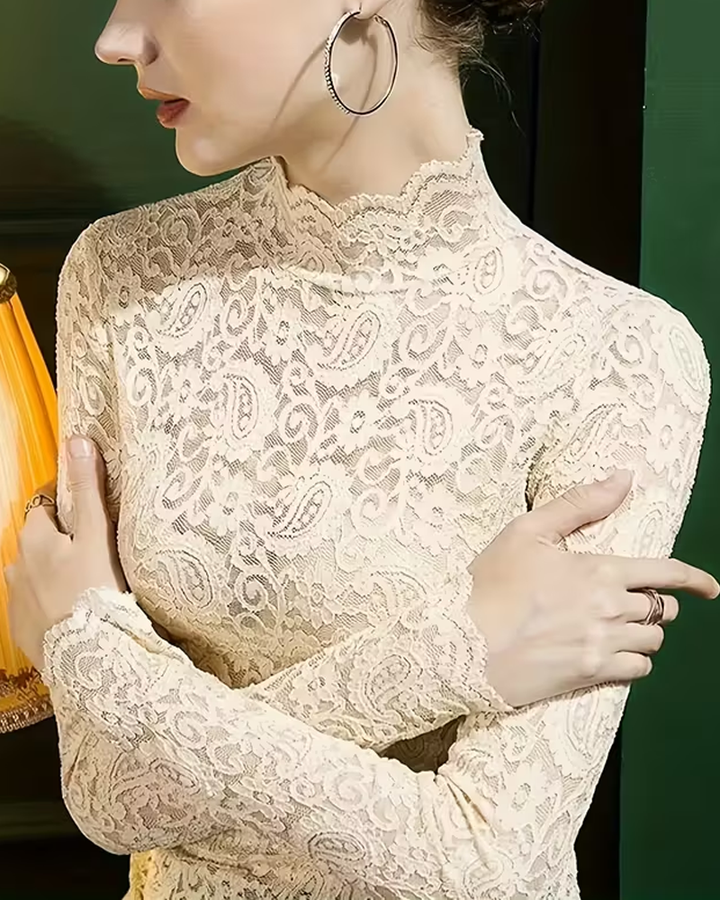 Chic semi-transparent lace long sleeve blouse with stand collar for women. Sophisticated style.