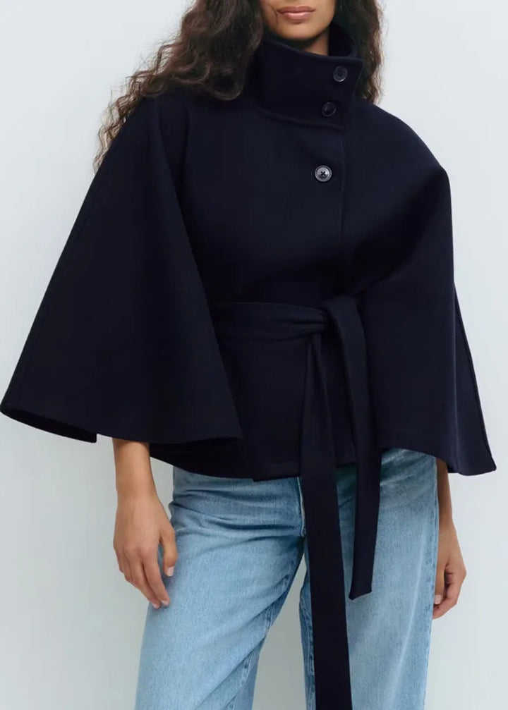 Stylish women's spring coat featuring a high neck and belt, ideal for fashionable casual wear