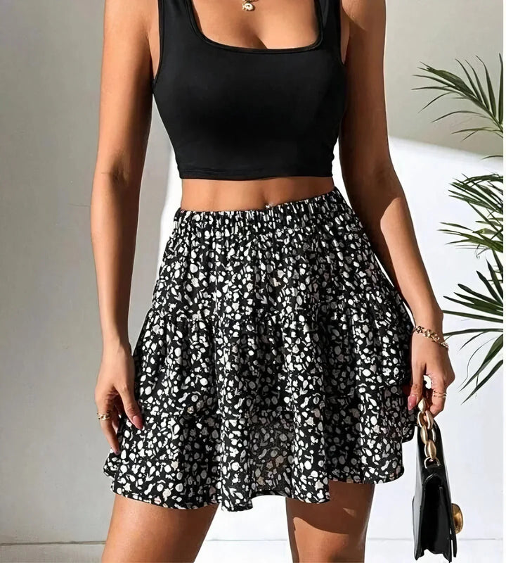 Stylish women's day dress, a spring mini with a distinctive skirt style hem.