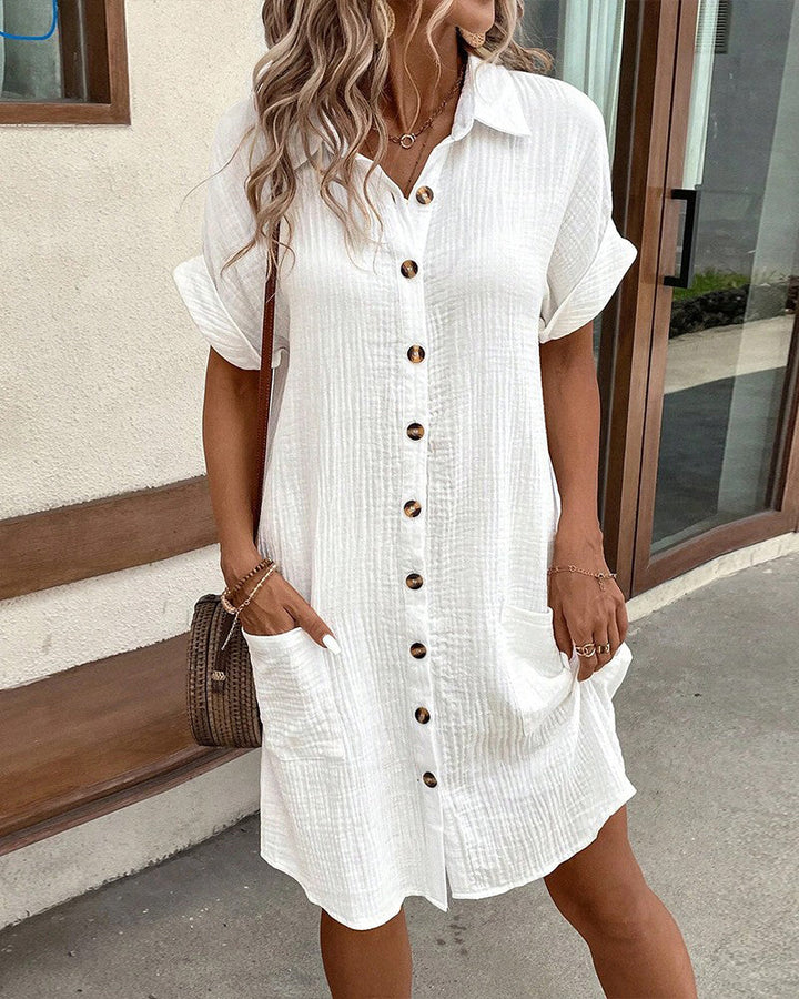 Elegant women's spring shirt dress, relaxed midi fit, perfect for versatile day-to-evening wear.