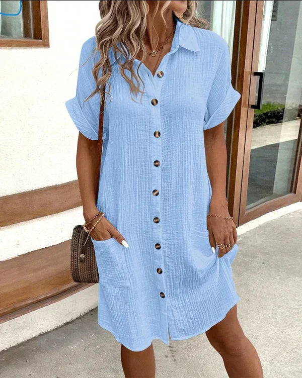 Relaxed fit women's midi shirt dress with elegant buttons, ideal for comfortable spring fashion & casual wear.
