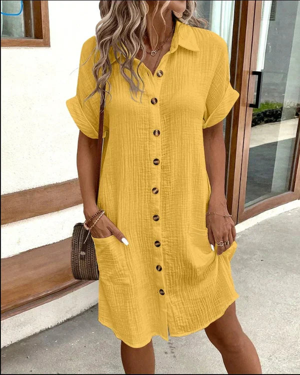 Comfortable women's spring shirt dress, relaxed fit, perfect for versatile elegant casual or daytime looks.