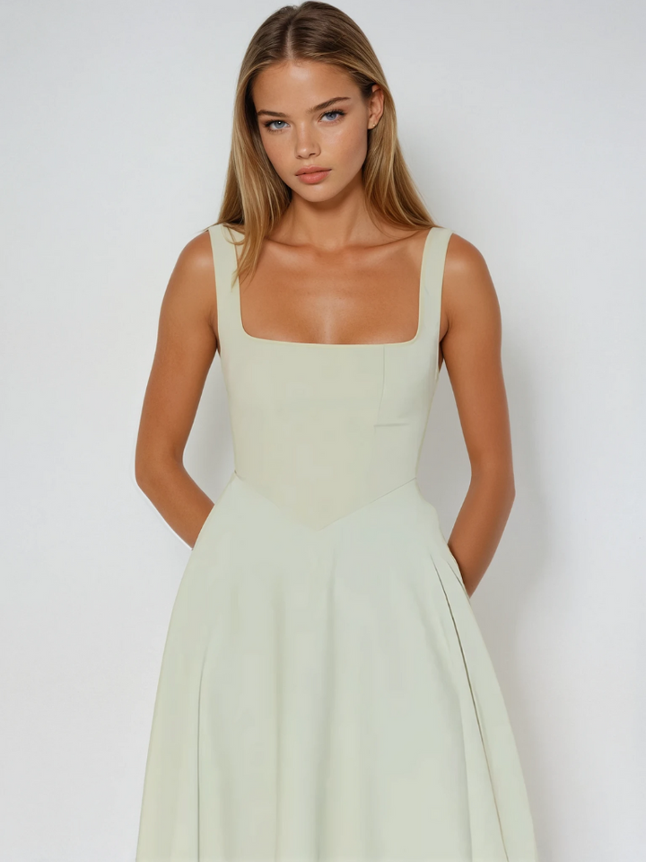 Flattering square neck midi dress for women, versatile for casual outings or elegant gatherings.