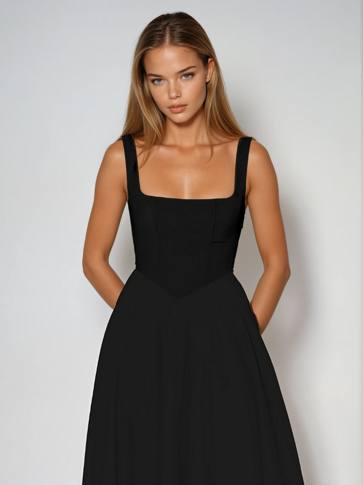 Close-up of the square neckline on an elegant cotton blend midi dress for women.