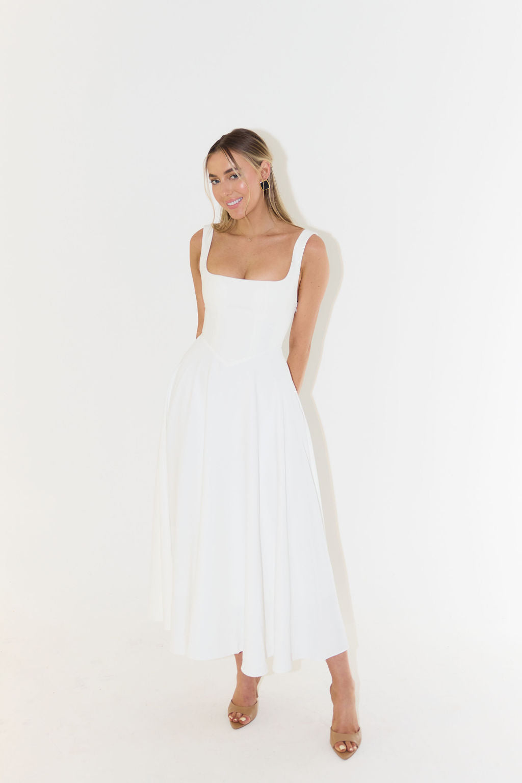 Flowy women's elegant square neck sleeveless midi dress. Comfortable fabric for summer casual & evening fashion.