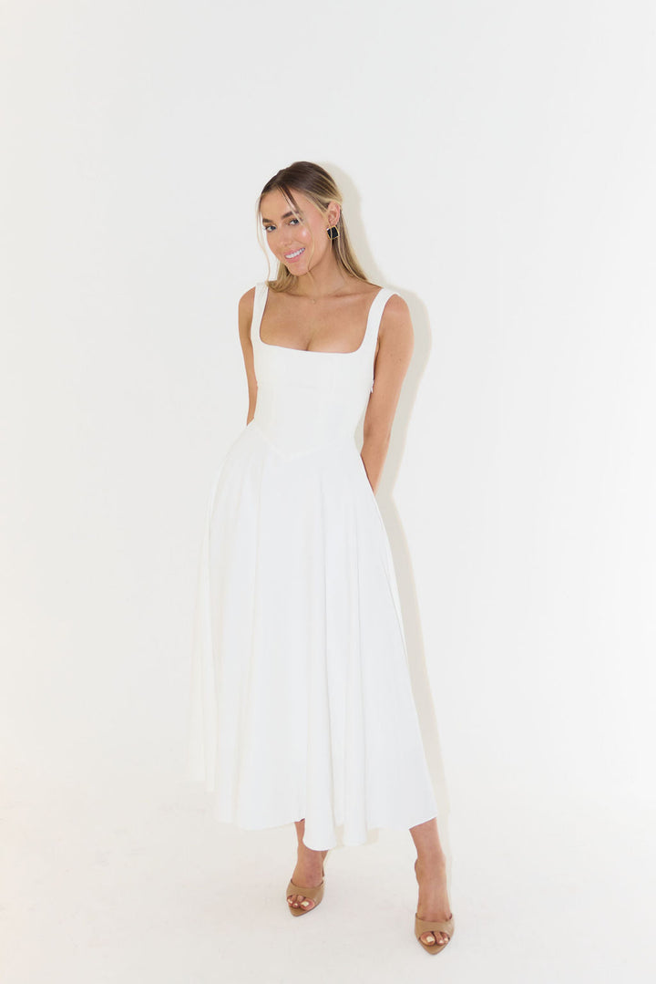 Flowy women's elegant square neck sleeveless midi dress. Comfortable fabric for summer casual & evening fashion.
