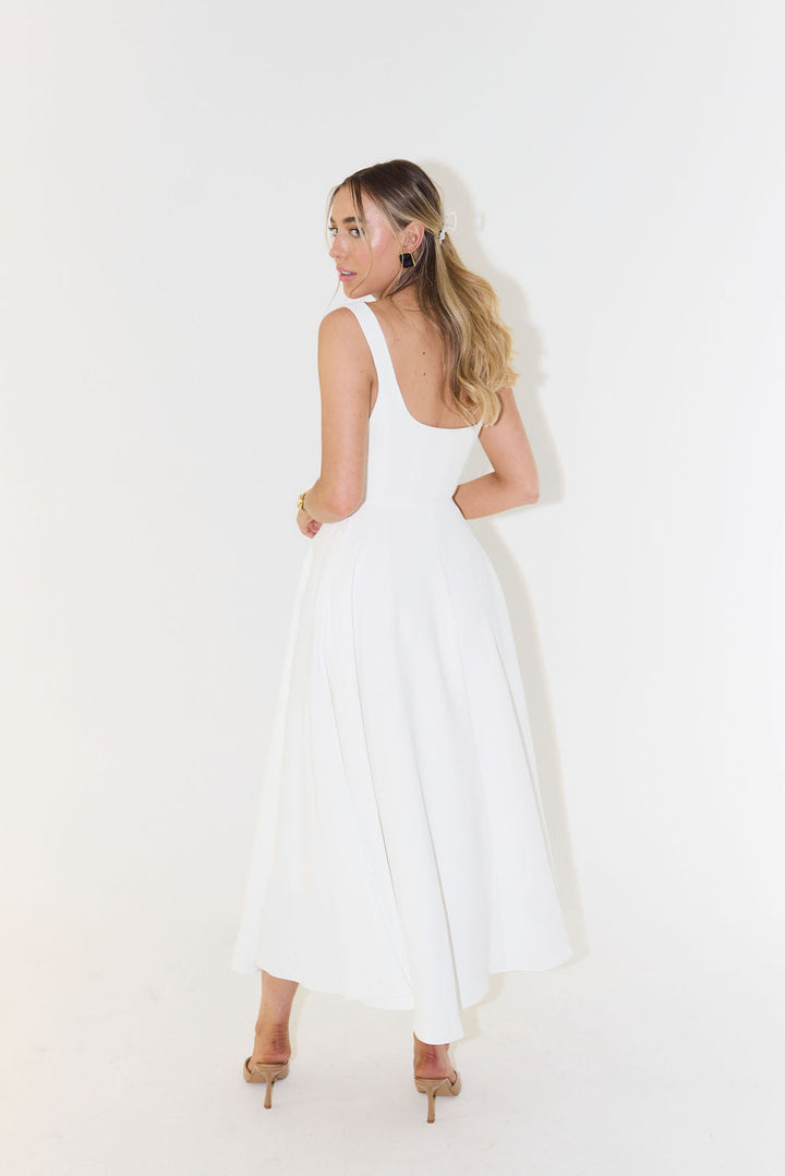 Flattering fit women's square neck midi dress. Sleeveless, elegant design. Great for versatile summer day/night wear.